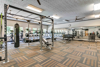 24-Hour fitness center with free weights
